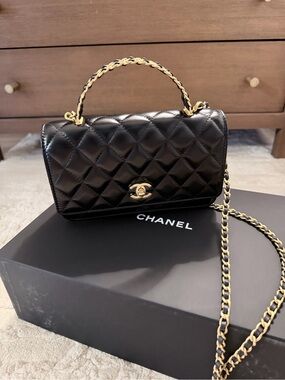 CHANEL Black Quilted Leather Top Handle Mini Flap Bag with Gold Hardware
New!
